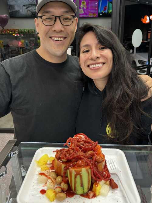 Pepinos Locos Couple who ordered Pepinos Locos at La Michoacana de Tocumbo in Santa Fe Springs